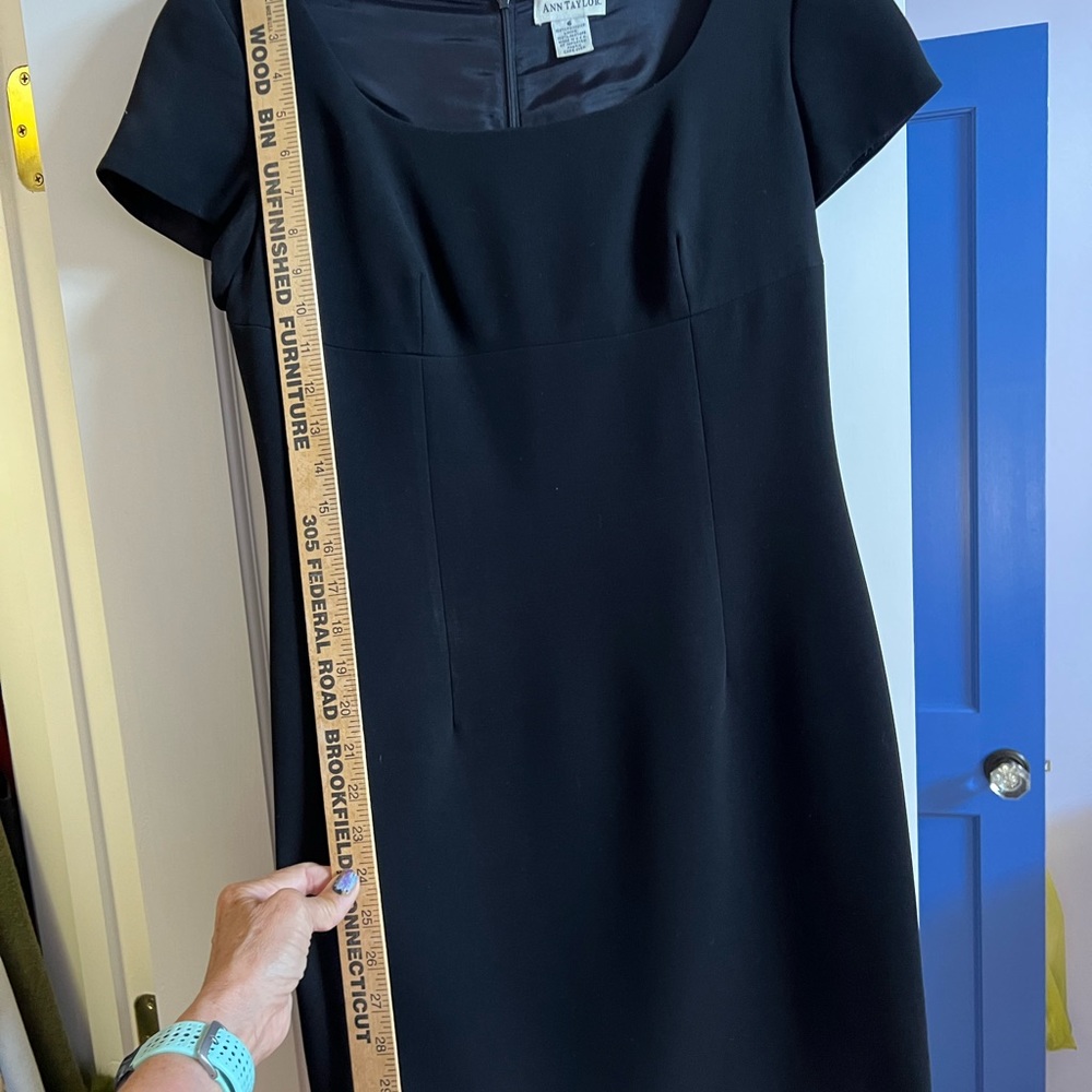 Ann Taylor fitted shirt sleeved black dress.,